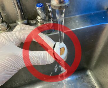 When no more frozen sections are needed for a block, do not use water directly on the sample, as it may get flushed away.